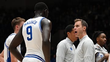 Duke basketball center Khaman Maluach and head coach Jon Scheyer