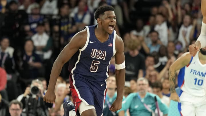 Aug 10, 2024; Paris, France; United States guard Anthony Edwards (5) reacts against France in the second half in the men's basketball gold medal game during the Paris 2024 Olympic Summer Games at Accor Arena. Mandatory Credit: Kyle Terada-USA TODAY Sports