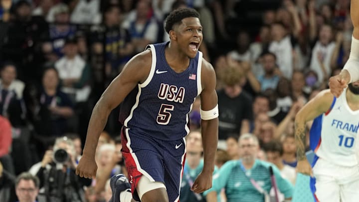 Aug 10, 2024; Paris, France; United States guard Anthony Edwards (5) reacts against France in the second half in the men's basketball gold medal game during the Paris 2024 Olympic Summer Games at Accor Arena. Mandatory Credit: Kyle Terada-Imagn Images