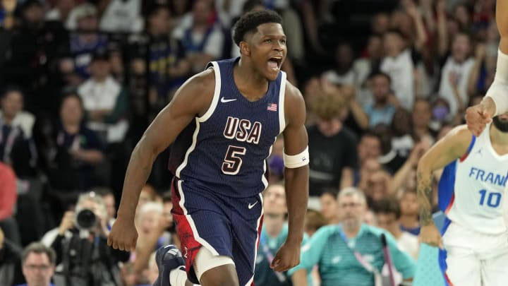 Aug 10, 2024; Paris, France; United States guard Anthony Edwards (5) reacts against France in the second half in the men's basketball gold medal game during the Paris 2024 Olympic Summer Games at Accor Arena. Mandatory Credit: Kyle Terada-USA TODAY Sports