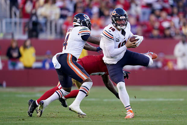 Chicago Bears quarterback Caleb Williams (18) runs the ball against the San Francisco 49ers