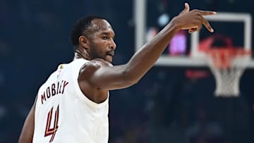 Oct 7, 2025; Cleveland, Ohio, USA; Cleveland Cavaliers forward Evan Mobley (4) celebrates after hitting a three point basket during the first quarter against the Chicago Bulls at Rocket Arena. Mandatory Credit: Ken Blaze-Imagn Images