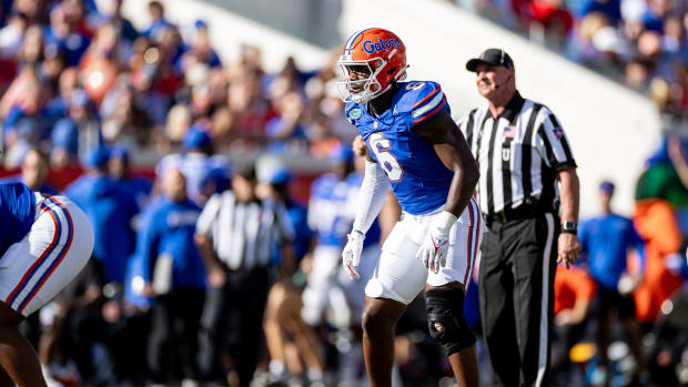 Florida Gators linebacker Shemar James (6) looks at the quarterback during the first half against the Georgia Bulldogs at Eve