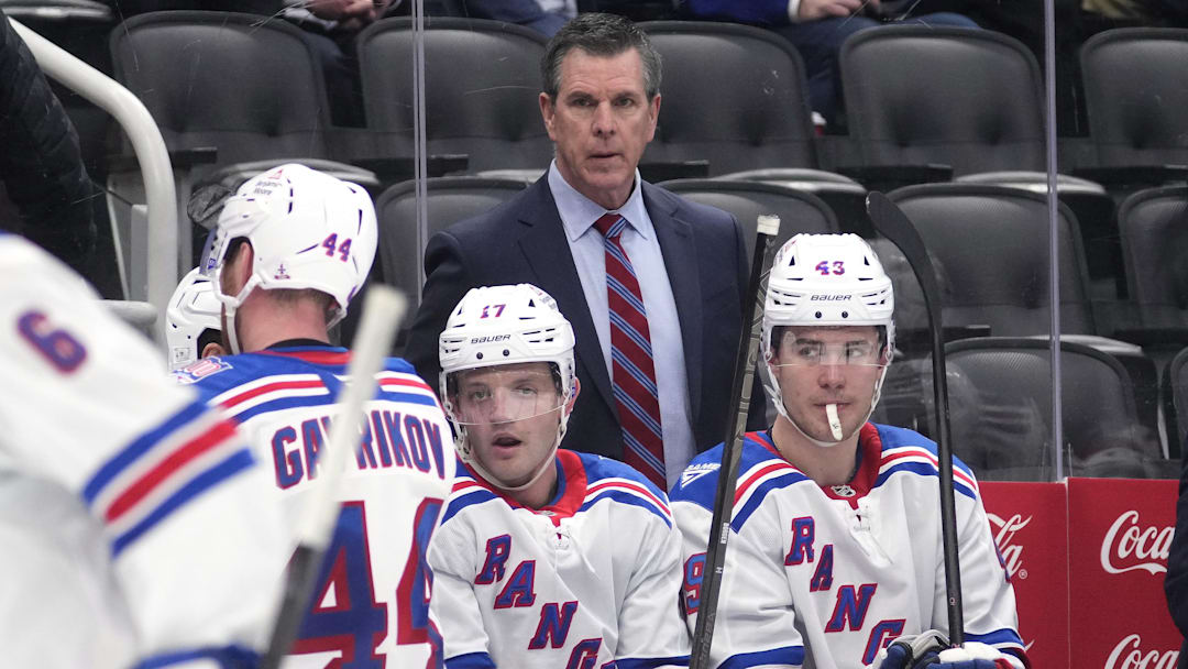 Mar 25, 2026; Toronto, Ontario, CAN; New York Rangers head coach Mike Sullivan (center) looks on from the bench during a break in the action against the Toronto Maple Leafs in the third period at Scotiabank Arena. Mandatory Credit: John E. Sokolowski-Imagn Images