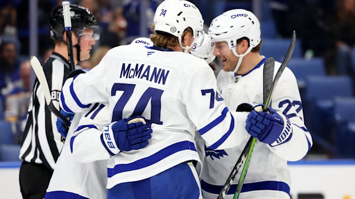 Dec 20, 2024; Buffalo, New York, USA;  Toronto Maple Leafs center Bobby McMann (74) celebrates his goal with teammates during the first period against the Buffalo Sabres at KeyBank Center. Mandatory Credit: Timothy T. Ludwig-Imagn Images