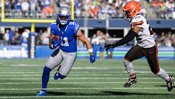 Seattle Seahawks wide receiver Jaxon Smith-Njigba carries the ball after a catch while chased by Cleveland Browns safety Grant Delpit 