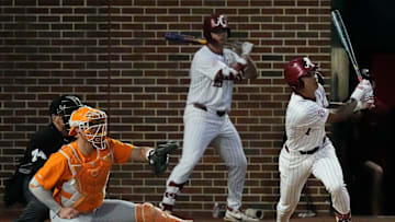 Mar 21, 2025; Tuscaloosa AL, USA; Alabama shortstop Justin Lebron (1) connects with a pitch during the second game of the series with Tennessee at Sewell-Thomas Stadium.