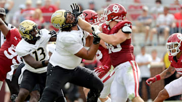 Oklahoma's Ethan Downs (40) blocks against Marcellus Marshall (72) in the first half of the college football game between the University of Oklahoma Sooners and the University of Central Florida Knights at Gaylord Family Oklahoma-Memorial Stadium in Norman, Okla., Saturday, Oct., 21, 2023.