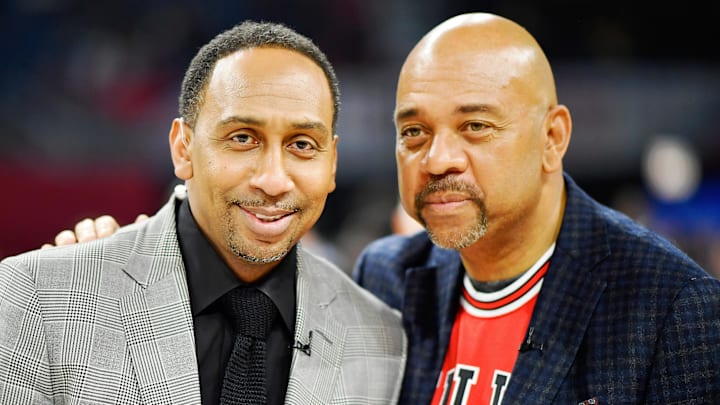 Team Stephen A. coach Stephen A. Smith and Team Wilbon coach Michael Wilbon pose for a photo during an ESPN program Team Stephen A. coach Stephen A. Smith and Team Wilbon coach Michael Wilbon pose for a photo during an ESPN program