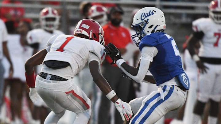 A fumbled kickoff gets kicked around between Central High's Christian Bishop (1) and Tuscaloosa County defensive back Kel Heard (2) at Tuscaloosa County High to kick off the 2024 high school football season. A fumbled kickoff gets kicked around between Central High's Christian Bishop (1) and Tuscaloosa County defensive back Kel Heard (2) at Tuscaloosa County High to kick off the 2024 high school football season.