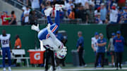 Sep 14, 2025; East Rutherford, New Jersey, USA; Buffalo Bills wide receiver Elijah Moore (18) reacts by doing a flip against the New York Jets during the second half at MetLife Stadium. Mandatory Credit: Vincent Carchietta-Imagn Images