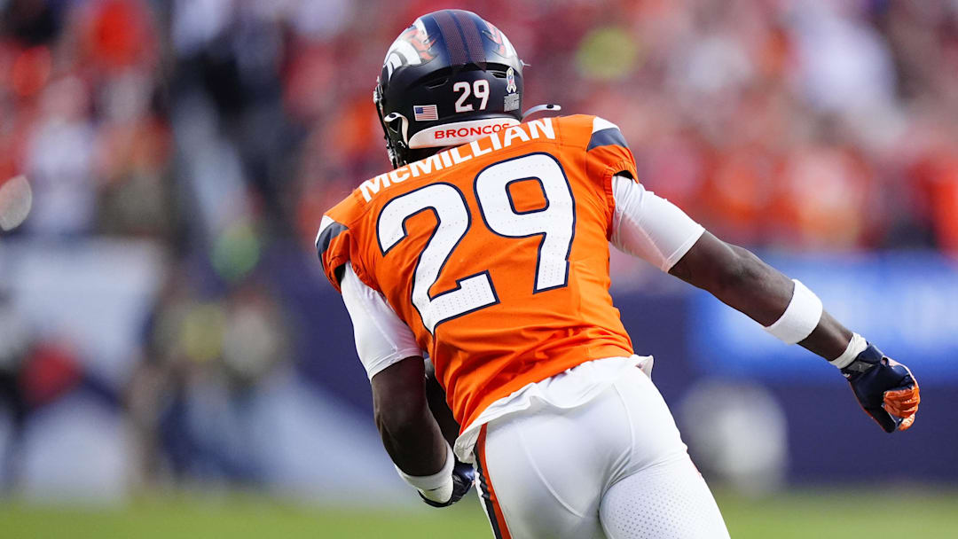 Nov 16, 2025; Denver, Colorado, USA; Denver Broncos cornerback Ja'Quan McMillian (29) returns an interception in the third quarter against the Kansas City Chiefs at Empower Field at Mile High. 
