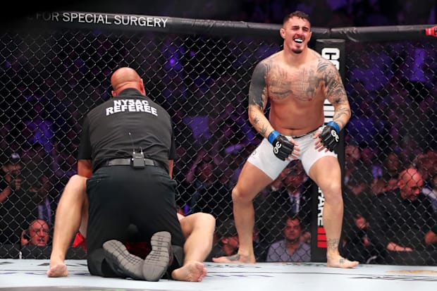 Tom Aspinall reacts to beating Sergei Pavlovichduring UFC 295 at Madison Square Garden. 