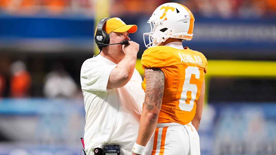 Tennessee head coach Josh Heupel talks to Tennessee quarterback Joey Aguilar (6) during the Aflac Kickoff Game between the Volunteers and Syracuse held at Mercedes-Benz Stadium in Atlanta, Ga., on August 30, 2025.