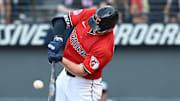 Sep 28, 2025; Cleveland, Ohio, USA;  Cleveland Guardians first baseman Kyle Manzardo (9) hits a double against the Texas Rangers during the eighth inning at Progressive Field. Mandatory Credit: Ken Blaze-Imagn Images