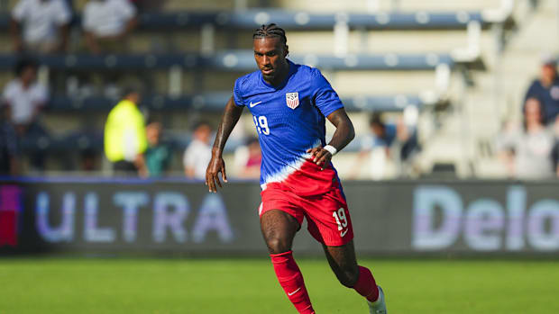 Haji Wright dribbles a soccer ball. 