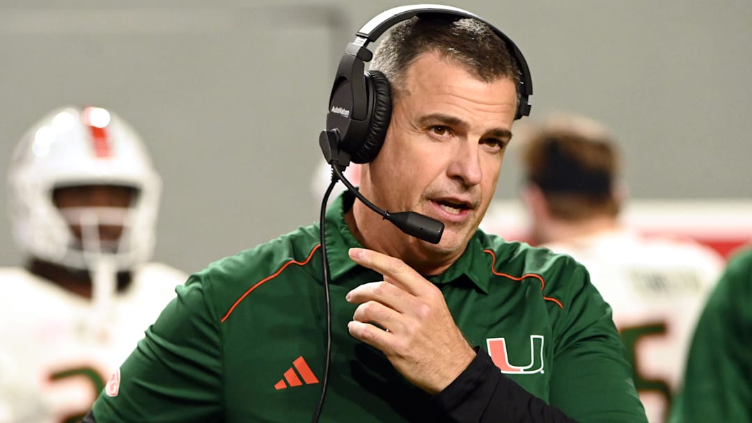 Nov 4, 2023; Raleigh, North Carolina, USA; Miami Hurricanes head coach Mario Cristobal looks on during the first half against the North Carolina State Wolfpack at Carter-Finley Stadium. Mandatory Credit: Rob Kinnan-Imagn Images