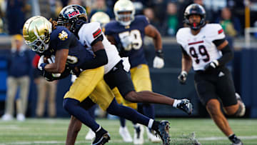 Northern Illinois cornerback Jacob Finley brings down Notre Dame wide receiver Kris Mitchell on Saturday.