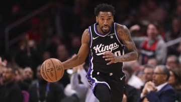 Mar 21, 2024; Washington, District of Columbia, USA;  Sacramento Kings guard Malik Monk (0) dribbles top the court during the first half against the Washington Wizards at Capital One Arena. Mandatory Credit: Tommy Gilligan-USA TODAY Sports