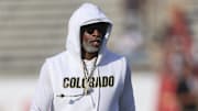 Sep 12, 2025; Houston, Texas, USA; Colorado Buffaloes head coach Deion Sanders walks on the field before the game against the Houston Cougars at TDECU Stadium. Mandatory Credit: Troy Taormina-Imagn Images