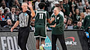 Michigan State head coach Tom Izzo shakes hands with guard Jase Richardson (11) during the first half of the Elite Eight round of NCAA tournament against Auburn at State Farm Arena in Atlanta, Ga. on Sunday, March 30, 2025.