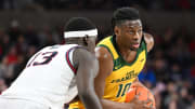 Jan 25, 2024; Spokane, Washington, USA; San Francisco Dons forward Jonathan Mogbo (10) controls the ball against Gonzaga Bulldogs forward Graham Ike (13) in the first half at McCarthey Athletic Center. Mandatory Credit: James Snook-USA TODAY Sports