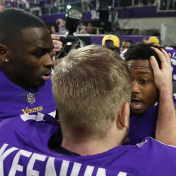 Jan 14, 2018; Minneapolis, MN, USA; Minnesota Vikings wide receiver Stefon Diggs (right) celebrates with quarterback Case Keenum (left) after the game-winning touchdown against the New Orleans Saints during the fourth quarter in the NFC Divisional Playoff football game at U.S. Bank Stadium. Mandatory Credit: Brace Hemmelgarn-USA TODAY Sports