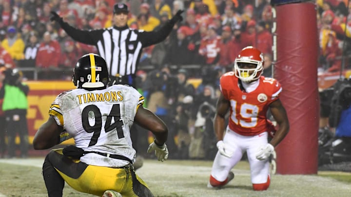 Jan 15, 2017; Kansas City, MO, USA; Pittsburgh Steelers inside linebacker Lawrence Timmons (94) gets up after defending Kansas City Chiefs wide receiver Jeremy Maclin (19) on a two-point conversion attempt during the fourth quarter in the AFC Divisional playoff game at Arrowhead Stadium. Mandatory Credit: Kirby Lee-Imagn Images