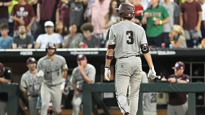 Jun 24, 2024; Omaha, NE, USA;  Texas A&M Aggies second baseman Kaeden Kent (3) walks back to the dugout after striking out against the Tennessee Volunteers during the eighth inning at Charles Schwab Field Omaha. Mandatory Credit: Steven Branscombe-Imagn Images