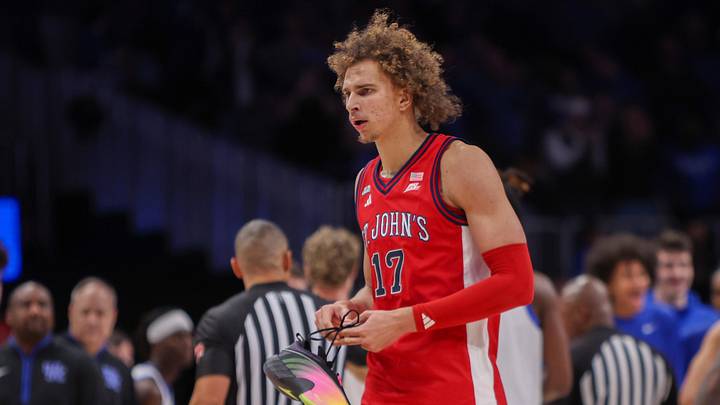 Dec 20, 2025; Atlanta, Georgia, USA; St. John basketball forward Ruben Prey (17) walks off the court with his shoe against the Kentucky Wildcats in the second half at State Farm Arena.