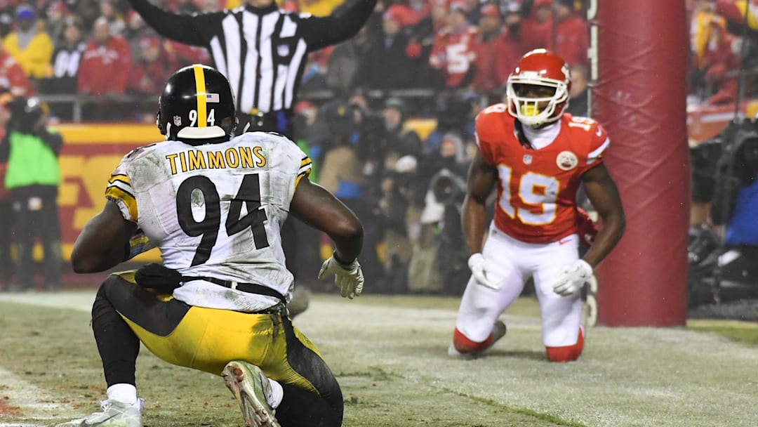 Jan 15, 2017; Kansas City, MO, USA; Pittsburgh Steelers inside linebacker Lawrence Timmons (94) gets up after defending Kansas City Chiefs wide receiver Jeremy Maclin (19) on a two-point conversion attempt during the fourth quarter in the AFC Divisional playoff game at Arrowhead Stadium. Mandatory Credit: Kirby Lee-Imagn Images