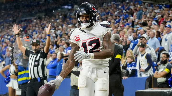 Houston Texans wide receiver Nico Collins (12) scores a touchdown Sunday, Nov. 30, 2025, during a game against the Indianapolis Colts at Lucas Oil Stadium in Indianapolis.