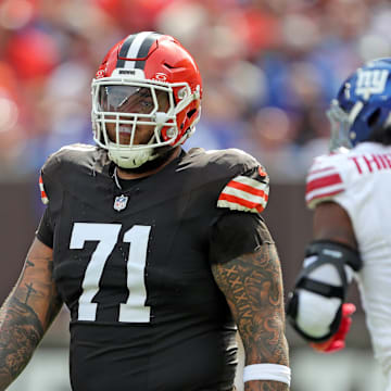 Browns offensive tackle Jedrick Wills Jr. heads back to the huddle after a play against the New York Giants, Sunday, Sept. 22, 2024, in Cleveland.