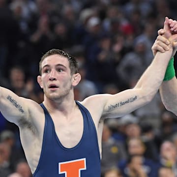Mar 22, 2025; Philadelphia, PA, USA; Lucas Byrd of the Illinois Fighting Illini celebrates win against Drake Ayala of the Iowa Hawkeyes (not pictured) during the Division I Men's Wrestling Championship held at Wells Fargo Center. Mandatory Credit: Eric Hartline-Imagn Images