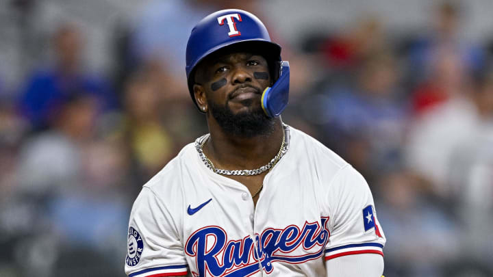 Jul 6, 2024; Arlington, Texas, USA; Texas Rangers right fielder Adolis García (53) reacts to striking out during the game between the Texas Rangers and the Tampa Bay Rays at Globe Life Field. Mandatory Credit: Jerome Miron-USA TODAY Sports