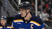 Jan 14, 2025; St. Louis, Missouri, USA; St. Louis Blues center Brayden Schenn (10) looks on against the Calgary Flames in the first period at Enterprise Center. Mandatory Credit: Joe Puetz-Imagn Images