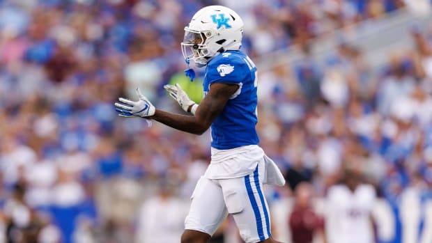 Kentucky Wildcats wide receiver Barion Brown celebrates a play during a college football game in the SEC.