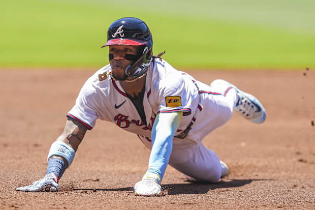 Atlanta Braves right fielder Ronald Acuna Jr slides into third base