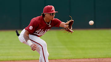 Feb 14, 2025; Tuscaloosa, AL, USA; Shortstop Justin Lebron takes a throw at second during Alabama baseball’s opening day at Sewell-Thomas Stadium against Bradley. The Crimson Tide defeated Bradley 10-6.