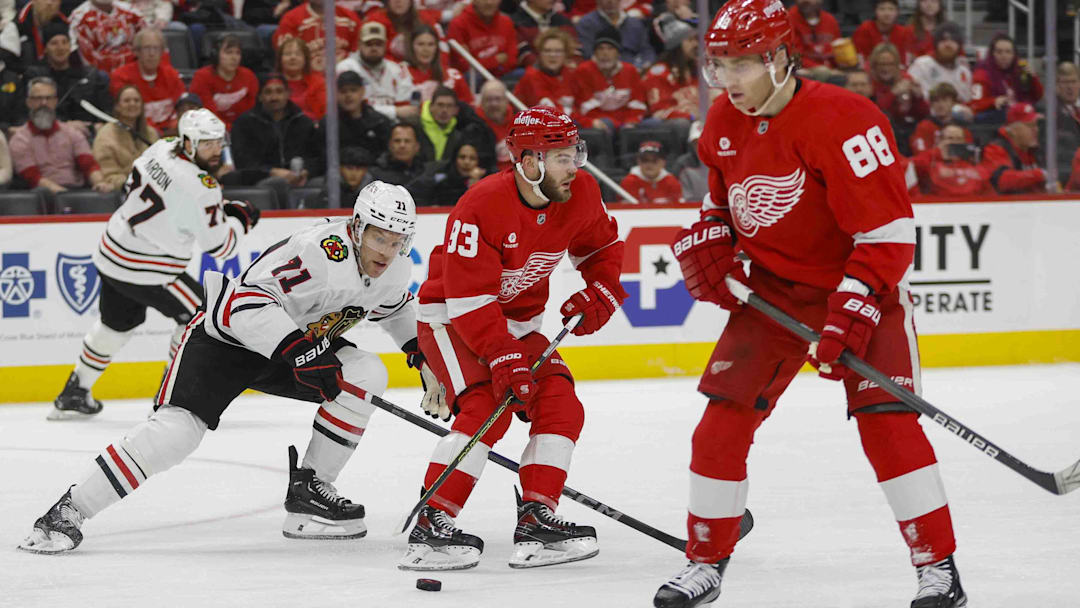 Jan 10, 2025; Detroit, Michigan, USA; Detroit Red Wings right wing Alex DeBrincat (93) handles the puck during the first period against the Chicago Blackhawks at Little Caesars Arena. Mandatory Credit: Brian Bradshaw Sevald-Imagn Images