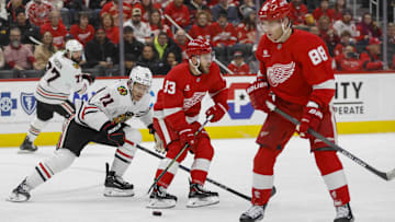 Jan 10, 2025; Detroit, Michigan, USA; Detroit Red Wings right wing Alex DeBrincat (93) handles the puck during the first period against the Chicago Blackhawks at Little Caesars Arena. Mandatory Credit: Brian Bradshaw Sevald-Imagn Images