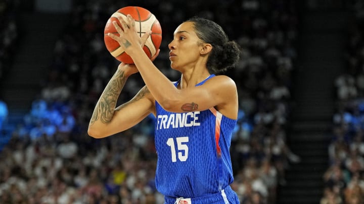 Aug 7, 2024; Paris, France; France forward Gabby Williams (15) shoots the ball against Germany in the women’s basketball quarterfinals during the Paris 2024 Olympic Summer Games at Accor Arena. 