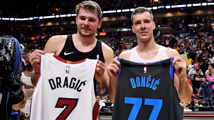 Mar 28, 2019; Miami, FL, USA; Dallas Mavericks forward Luka Doncic (L) and Miami Heat guard Goran Dragic (R) swap jerseys after the game at American Airlines Arena. Mandatory Credit: Jasen Vinlove-USA TODAY Sports