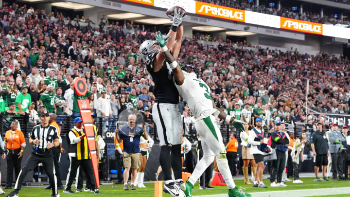 Nov 12, 2023; Paradise, Nevada, USA; Las Vegas Raiders tight end Michael Mayer (87) makes a touchdown reception over the reach of New York Jets safety Jordan Whitehead (3) during the fourth quarter at Allegiant Stadium. Mandatory Credit: Stephen R. Sylvanie-USA TODAY Sports