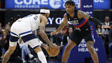  Minnesota Timberwolves guard Nickeil Alexander-Walker (9) is defended by Detroit Pistons guard Marcus Sasser (25) in the first half at Little Caesars Arena.