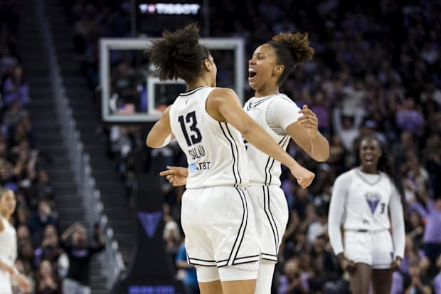 Golden State Valkyries forward Janelle Salaun is congratulated by center Iliana Rupert.