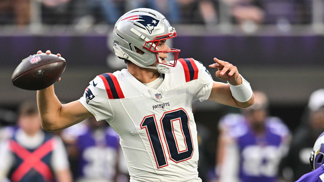 Aug 16, 2025; Minneapolis, Minnesota, USA;  New England Patriots quarterback Drake Maye (10) throws a pass against the Minnesota Vikings during the first quarter at U.S. Bank Stadium. Mandatory Credit: Jeffrey Becker-Imagn Images