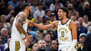 Indiana Pacers guard Tyrese Haliburton (0) celebrates with forward Obi Toppin.