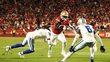 Oct 27, 2024; Santa Clara, California, USA; San Francisco 49ers wide receiver Deebo Samuel Sr (1) carries the ball against Dallas Cowboys cornerback Trevon Diggs (7) and safety Donovan Wilson (6) during the third quarter at Levi's Stadium. Mandatory Credit: Kelley L Cox-Imagn Images
