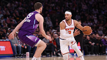 Jan 1, 2025; New York, New York, USA; New York Knicks guard Josh Hart (3) dribbles in front of Utah Jazz guard Svi Mykhailiuk (19) during the second half at Madison Square Garden. Mandatory Credit: Vincent Carchietta-Imagn Images